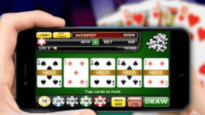 person playing online video poker on mobile